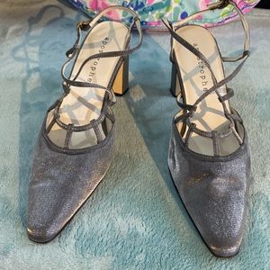 Apostrophe silver caged strap heels